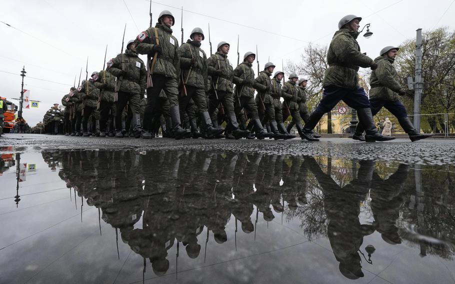 Russian army soldiers march to attend a dress rehearsal