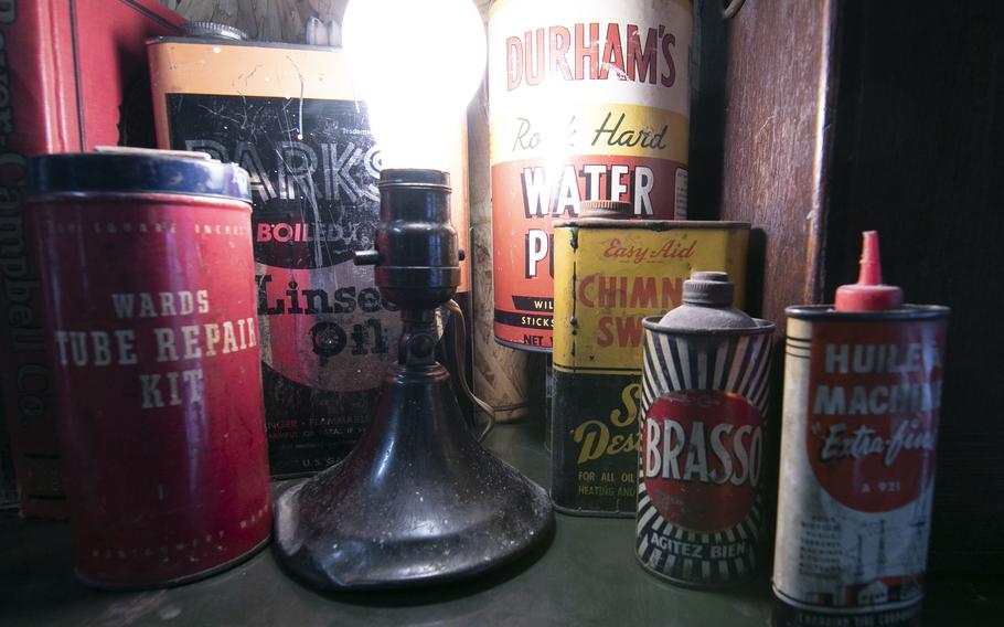 Brighton Township resident Justin Billard appreciates the look of vintage shop tools and supplies, displaying them proudly in his garage shop on Nov. 9, 2021.