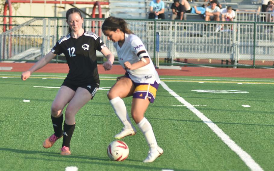 Vicenza’s Penelope Gaspard and Bahrain’s Haya Al Nusuf battle for the ball Friday, April 12, 2024, in the Cougars 1-0 victory.
