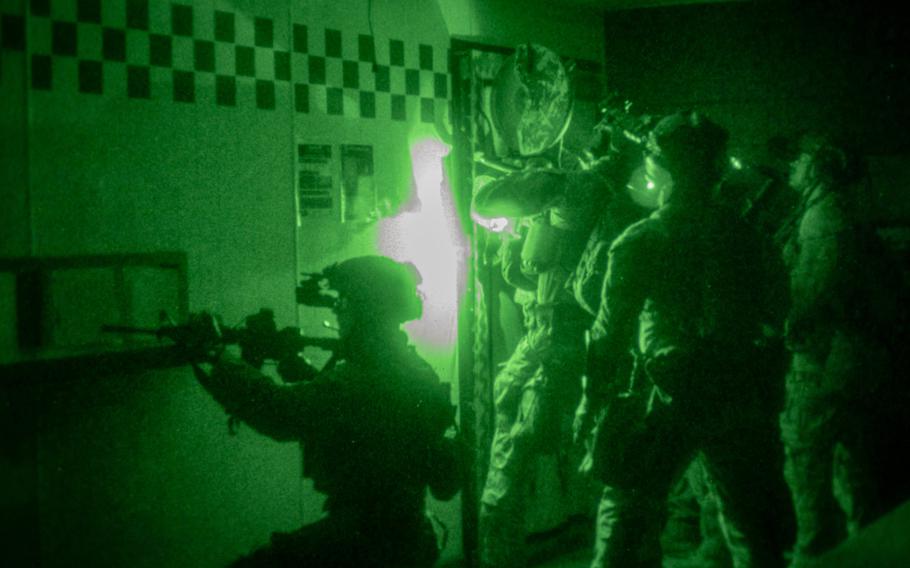 U.S. Marines with the 31st Marine Expeditionary Unit Maritime Raid Force utilize a saw to breach an entrance while conducting a limited scale raid during the Realistic Urban Training Exercise 23.1 in Aloha Stadium, Aeia, Hawaii, Jan. 17, 2023. 