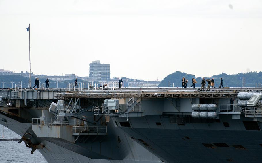 The aircraft carrier USS Ronald Reagan is pictured at Yokosuka Naval Base, Japan, Sept. 25, 2023.