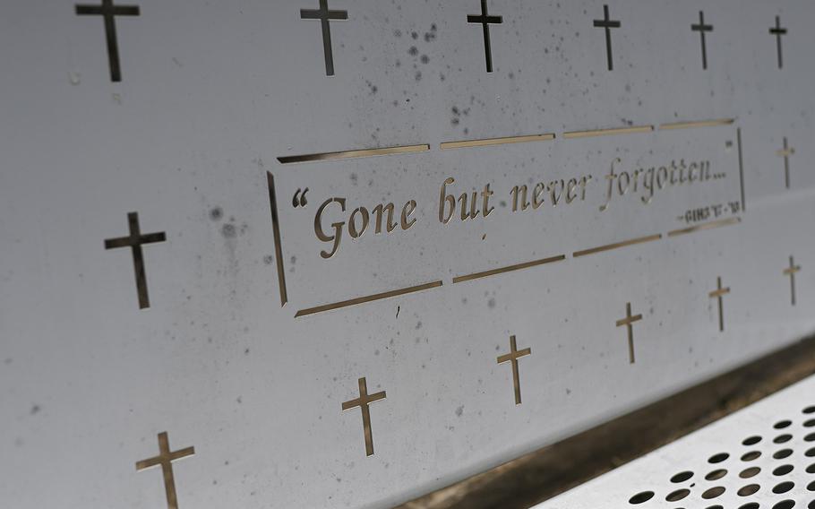 A bench with crosses sits outside the former First Baptist Church on June 7, 2022, in Sutherland Springs. 