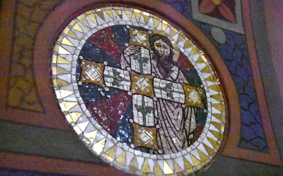 A small stained glass window helps illuminate the Church of the Sacred Heart of Jesus in Bolzano, Italy. The church was built in 1897.