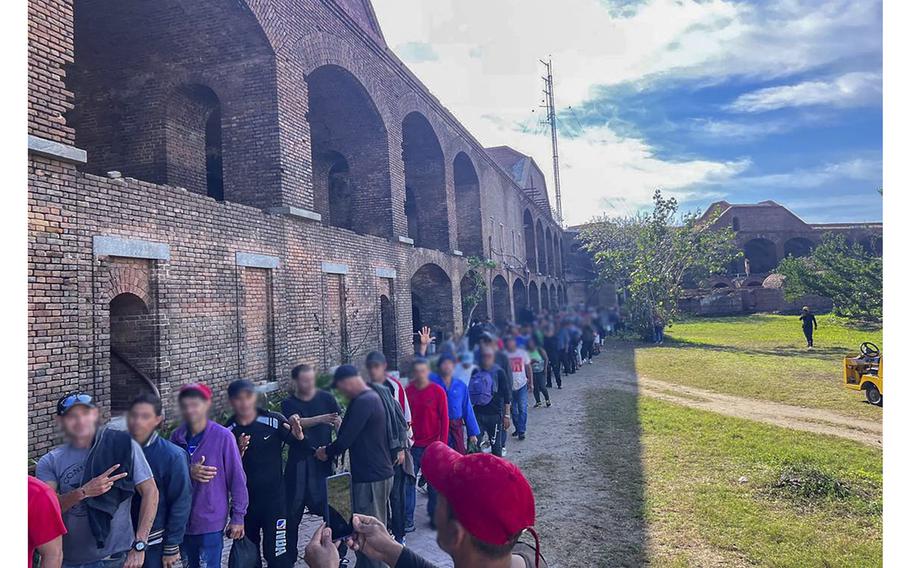 Cuban migrants are seen being held at Dry Tortugas National Park on Jan. 4, 2023. The Coast Guard shipped 337 Cuban migrants from the national park to Key West on Jan. 5, 2023, for processing. 