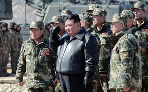 North Korean leader Kim Jong Un observes marksmanship training, March 6, 2024, in this image from the state-run Korean Central News Agency.
