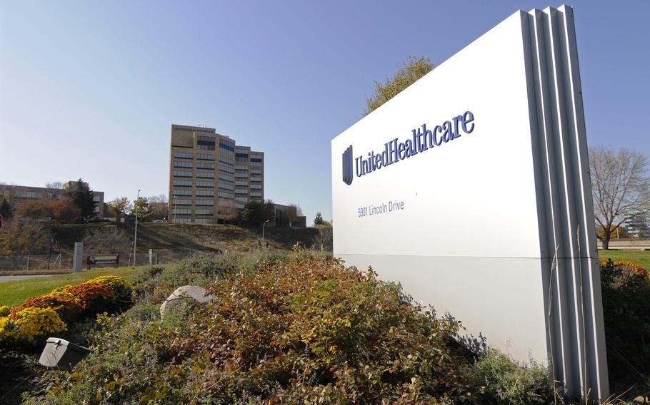 A sign stands on UnitedHealth Group Inc.’s campus in Minnetonka, Minn., on Oct. 16, 2012.