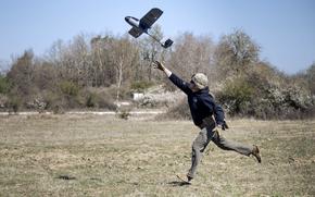 Army Sgt. 1st Class Matthew Pope of the 2nd Multi-Domain Task Force hand-launches a homemade, 3D-printed fixed-wing drone at the Joint Multinational Readiness Center in Hohenfels, Germany, April 11, 2025. The task force and the 56th Artillery Command are being combined, Gen. Christopher Donahue, commander of U.S. Army Europe and Africa, said June 25, 2025.