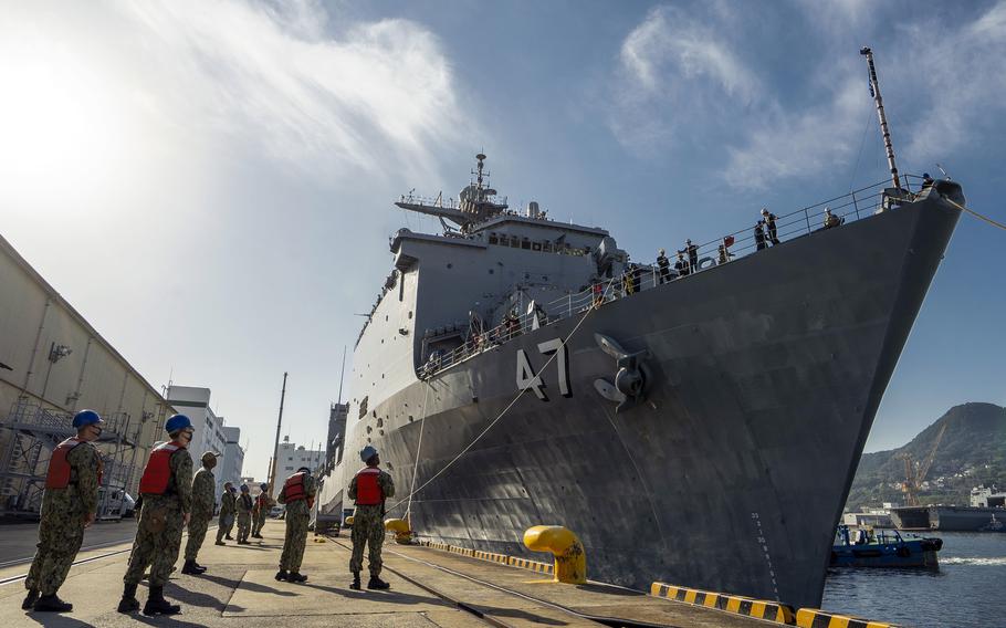 The amphibious dock landing ship USS Rushmore arrives at Sasebo Naval Base, Japan, its new homeport, Wednesday, Nov. 17, 2021. 