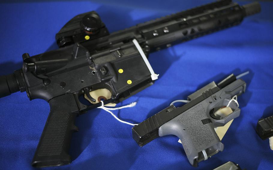 Untraceable “ghost guns” recovered by police on display in Washington, D.C., in February 2020. 