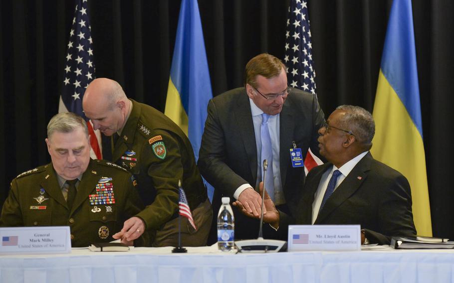From left, U.S. Army Gen. Mark Milley speaks with Gen. Christopher Cavoli while German Defense Minister Boris Pistorius greets U.S. Defense Secretary Lloyd Austin during the opening of the Ukraine Defense Contact Group meeting April 21, 2023, at Ramstein Air Base in Germany. Cavoli leads U.S. European Command and is NATO's supreme allied commander.
