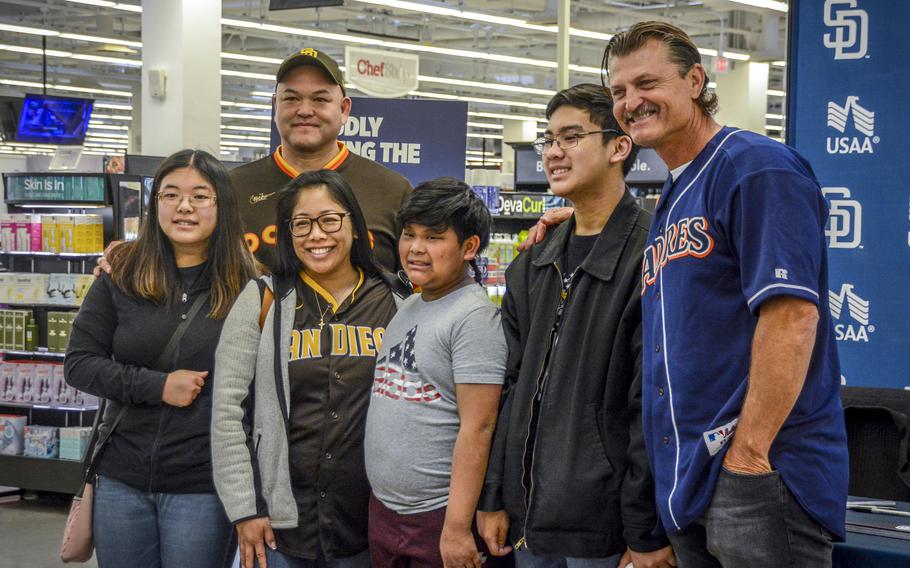 MLB Hall of Famer Trevor Hoffman poses with San Diego Padres fans during a meet-and-greet inside the main exchange at Camp Humphreys, South Korea, March 17, 2024.