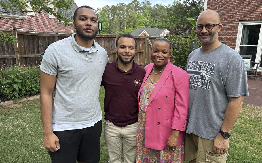 Michelle and Richard Beck, right, of Atlanta with their two sons, Dylan, and Richard, left. 