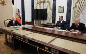 CORRECTS NAME SPELLING  Russian President Vladimir Putin, left, meets with Russian Deputy Defense Minister Yunus-Bek Yevkurov, second right, and Chairman of the St. Petersburg regional public organization "League for the Protection of the Interests of Veterans of Local Wars and Military Conflicts" retired Col. Andrei Troshev in Moscow, Russia, Thursday, Sept. 28, 2023. (Mikhail Metzel, Sputnik, Kremlin Pool Photo via AP)