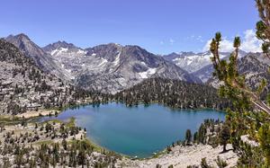 On the hike down from Kearsarge Pass — a nearly 11,800-foot gateway to the High Sierra — trekkers are greeted by a series of glittering lakes, including Bullfrog Lake, above. 