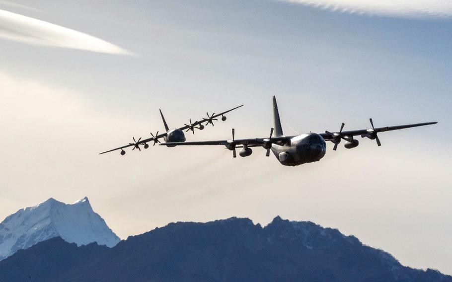 An Air Force MC-130J Commando II, left, assigned to the 353rd Special Operations Wing at Kadena Air Base, Okinawa, flies over New Zealand’s South Island alongside a C-130H Hercules from the Royal New Zealand Air Force, May 13, 2022. 