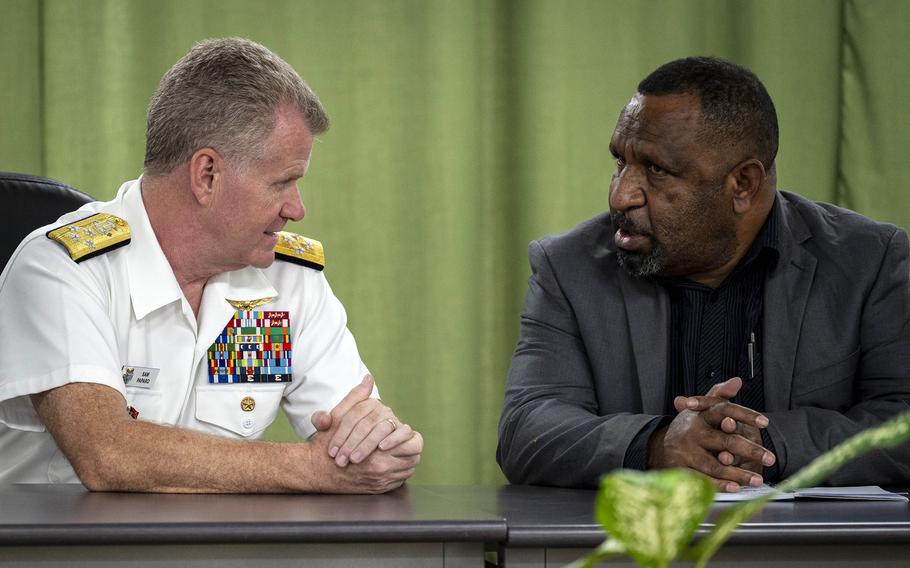 Adm. Samuel Paparo, head of U.S. Indo-Pacific Command, speaks with Papua New Guinea Defense Minister Billy Joseph.