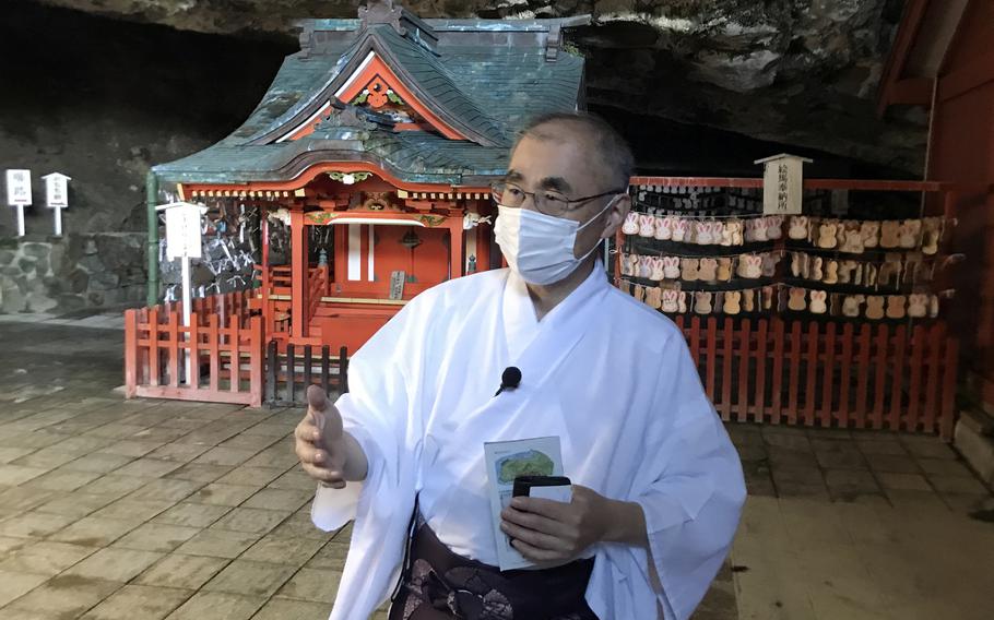A Shinto priest speaks at Udo Shrine, the mythical birthplace of the father of Japan’s first emperor, on the east coast of the country’s southern island of Kyushu. 