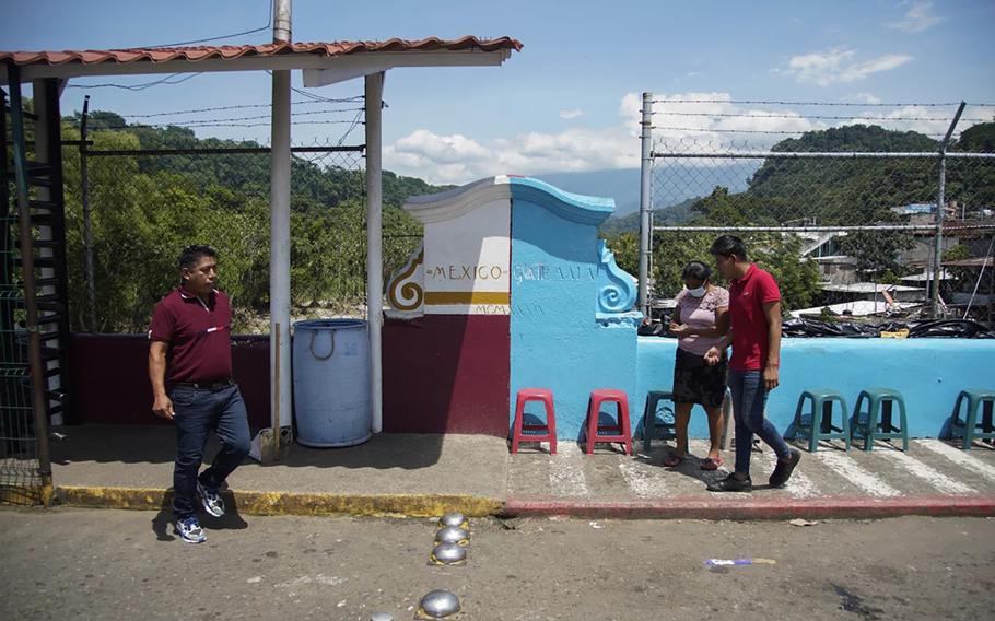 Pedestrians cross between Mexico and Guatemala at the port of entry that connects El Carmen in the San Marcos department of Guatemala with Talisman in Chiapas, Mexico.