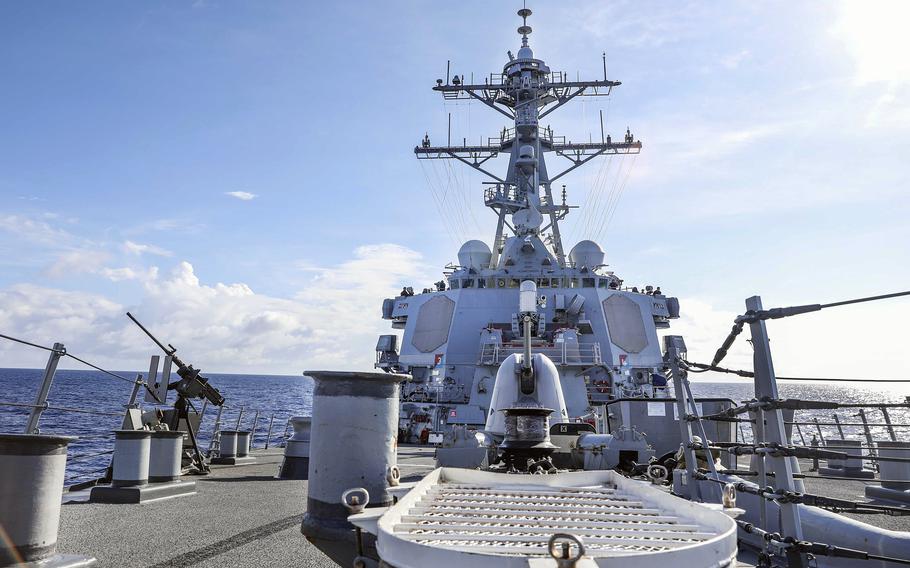 The guided-missile destroyer USS Benfold sails through the South China Sea, Wednesday, Sept. 8, 2021. 