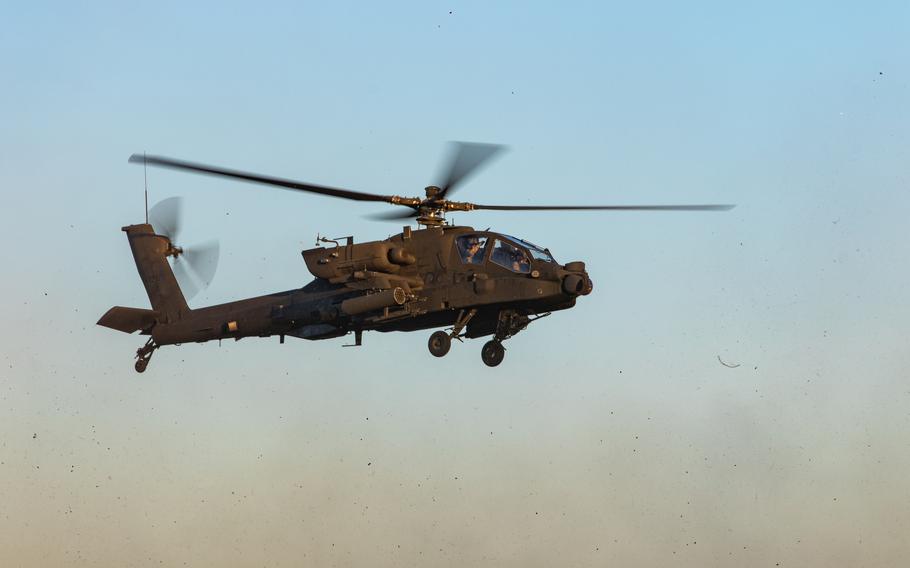 An AH-64E Apache helicopter assigned to the 16th Combat Aviation Brigade lands at Joint Base Lewis-McChord, Wash., in July 2023. 