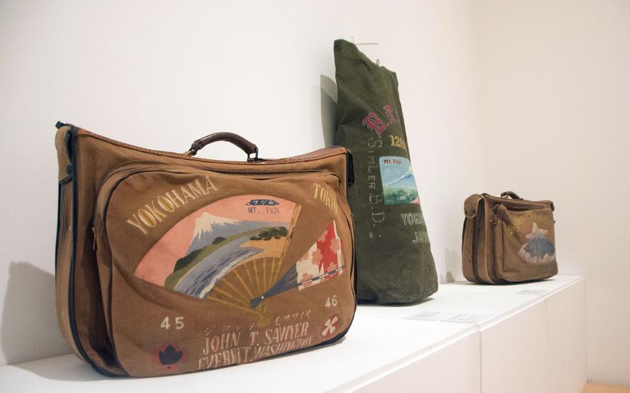 Custom suitcases, portraits painted on silk, cushion covers, embroidered Navy uniforms and even receipts from the Navy Exchange circa 1966 are available for viewing this month at the Yokosuka Museum of Art.