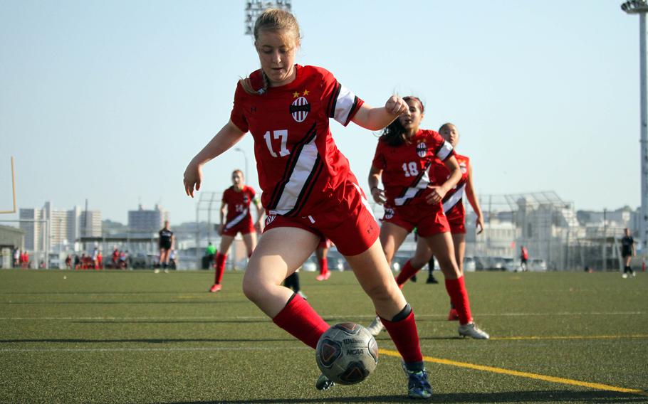 McKenzie Talbot tries to control the ball.