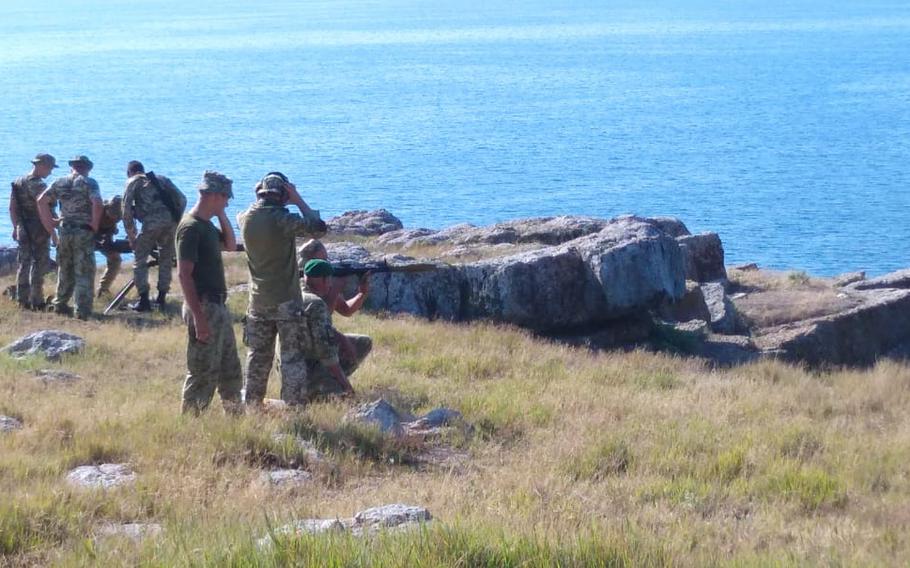 Members of Ukraine’s State Border Guard Service conduct firing drills on Snake Island in August 2020. The island was attacked and taken by Russian troops on Feb. 25, 2022. 