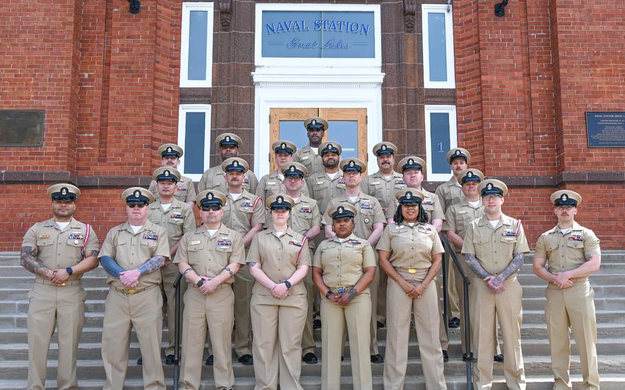 A group of Navy chiefs pose for a photo