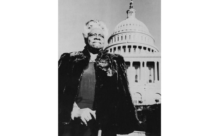 Portrait of American educator and activist Mary McLeod Bethune (1875-1955) with the United States Capitol Building in the background, circa 1950.