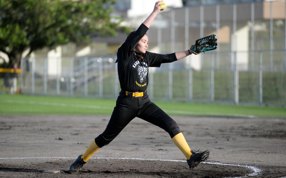 Kadena right-hander Nao Grove kicks and delivers against Kubasaki during Tuesday's DODEA-Okinawa softball game. Grove scattered seven hits and struck out two over five innings as the Panthers won 8-2 and took a 2-0 season-series lead.