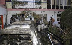 FILE - Afghans inspect damage of Ahmadi family house after U.S. drone strike, Aug. 29, 2021, in Kabul, Afghanistan. The Afghan survivors of an errant U.S. drone strike in August that killed 10 members of their family, including seven children, said Tuesday, Dec. 14, 2021, that they are frustrated and saddened by a decision that no U.S. troops involved in the strike will face disciplinary action.  (AP Photo/Khwaja Tawfiq Sediqi, File)