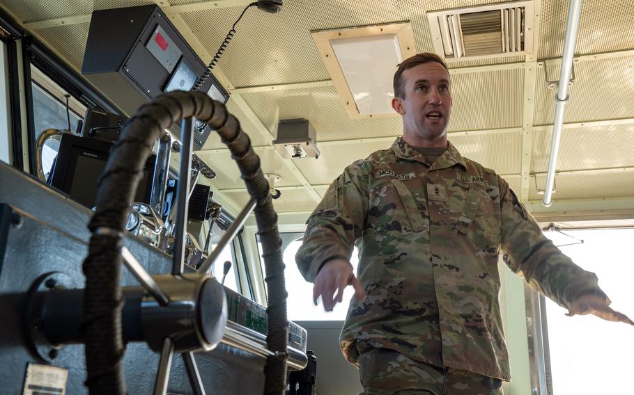 Army Warrant Officer 2 Jason McElrath gives a tour of the USAV Calaboza, a landing craft utility vessel, at Yokohama North Dock, Japan, Thursday, Dec. 8, 2024. 