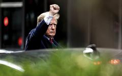 Former President Donald Trump gestures as he departs Trump Tower, Wednesday, Aug. 10, 2022, in New York, on his way to the New York attorney general's office for a deposition in a civil investigation. 
