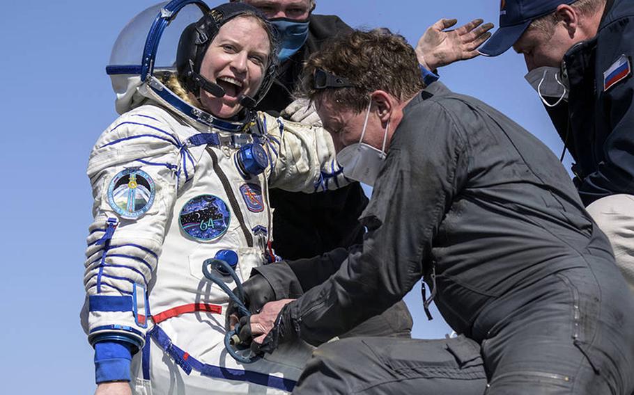 Expedition 64 NASA astronaut Kate Rubins is helped out of a Soyuz MS-17 spacecraft just minutes after she, and two Russian cosmonauts, landed in a remote area near the town of Zhezkazgan, Kazakhstan, April 17, 2021. Just months after completing her second space mission, Rubins has been commissioned in the U.S. Army Reserve.
