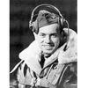 Rauh in his flight jacket with headphones on.