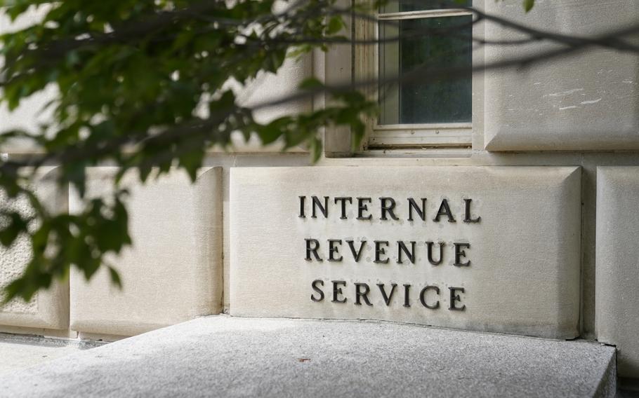 This May 4, 2021, photo shows a sign outside the Internal Revenue Service building in Washington. 