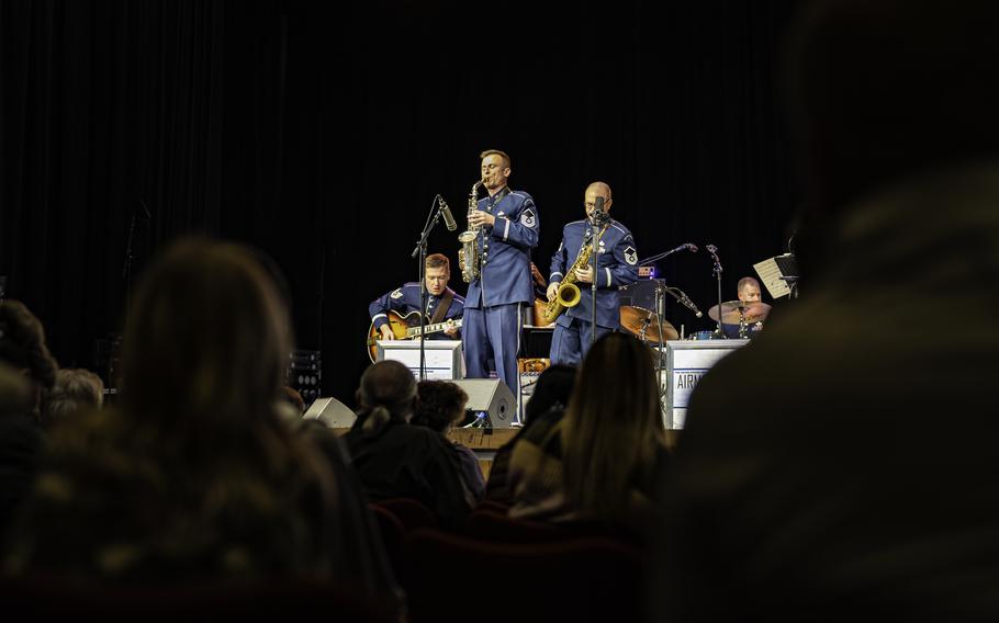 Master Sgt. Kristian Baarsvik, Airmen of Note lead alto saxophonist, and Master Sgt. Tedd Baker, Airmen of Note lead tenor saxophonist, perform during a concert at Kiva Auditorium, N.M., Nov. 17, 2023.