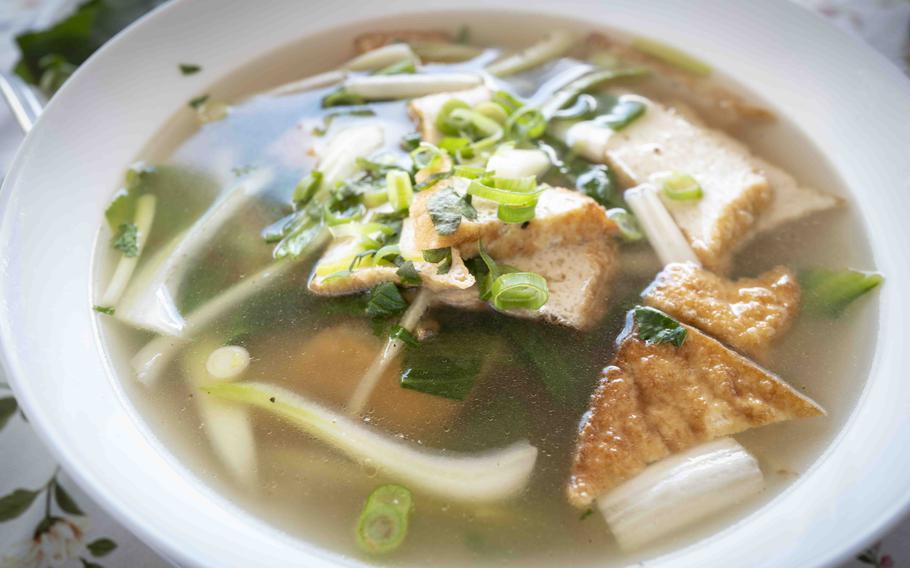 A steaming bowl of pho, a staple dish of Vietnam, served at Bun Viet in Unterammergau, Germany, Sept. 8, 2023. The broth is prepared with herbs like coriander and mint as well as ingredients such as cinnamon, cardamom, ginger and a specially fermented fish sauce.