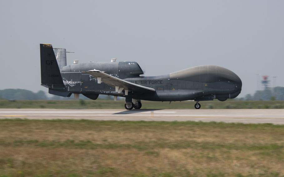 An EQ-4 Global Hawk touches down at Grand Forks Air Force Base, N.D., July 29, 2021. A remotely piloted Global Hawk with the call sign FORTE12 was the last aircraft tracked over Ukraine before Russia forces invaded and the countrys airspace was shut down to civilian air traffic, according to the global flight tracking service Flightradar24.