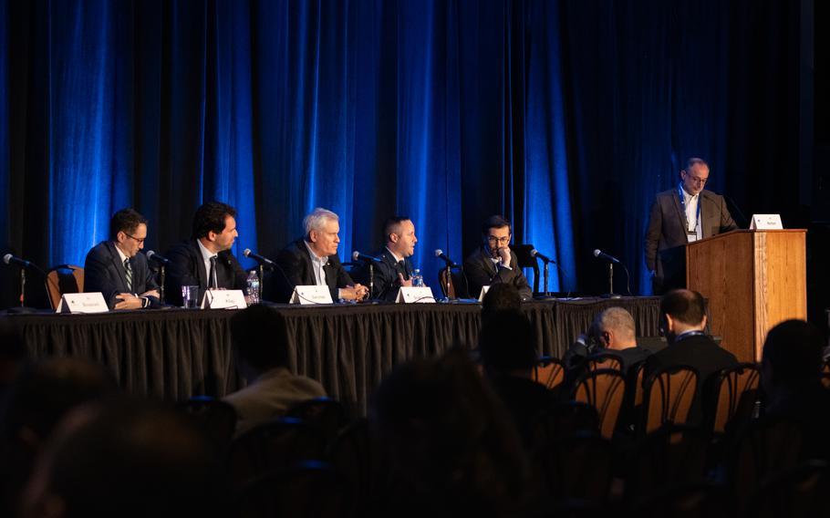 U.S. Air Force Lt. Col. A. Walter Shedroff, center, Joint Task Force-Space Defense plans transition branch chief, participates as a panelist during the 38th annual Space Symposium, Colorado Springs, Colorado, April 19, 2023.