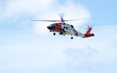 A Coast Guard H-60 Jayhawk helicopter crew arrives at Coast Guard Air Station Clearwater, Fla, July 13, 2021. 