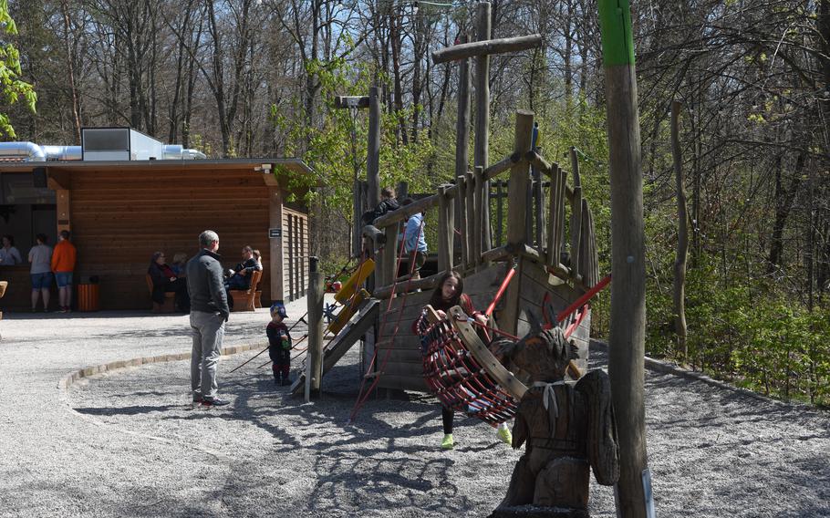 Kids can play on a wooden pirate ship or swing while their parents relax at the Peters Alm beer garden in Homburg, Germany.