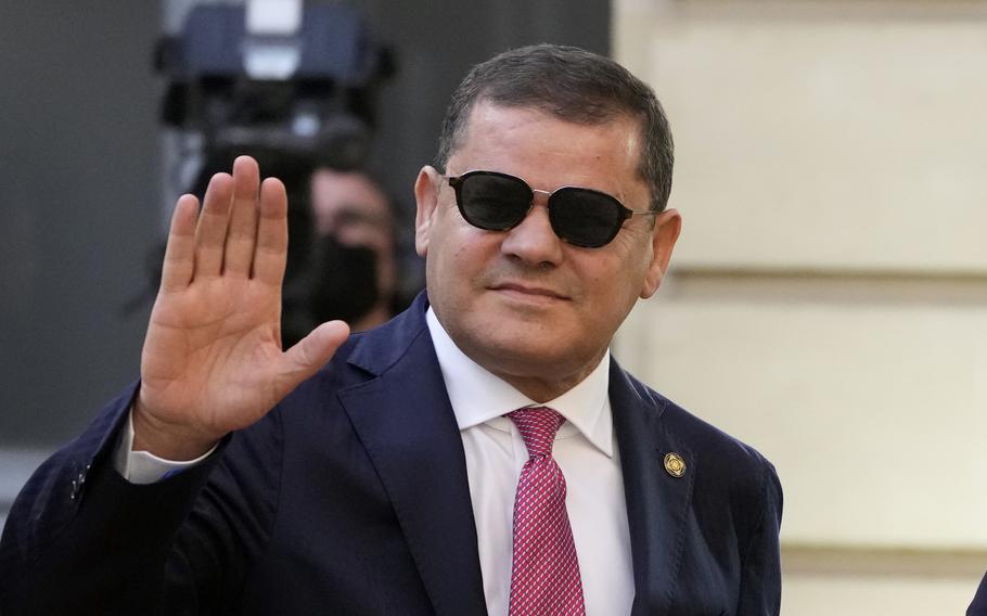 Libyan Prime Minister Abdul Hamid Dbeibah gestures as he arrives for a conference with several world leaders in Paris, Friday, Nov. 12, 2021. Libya’s interim prime minister filed a request Sunday, Nov. 21, to run for president despite being technically barred from the upcoming elections.