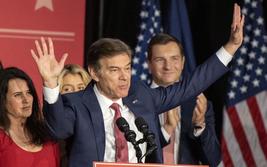 Mehmet Oz and his wife, Lisa, at his election watch party on November 8, 2022, at the Newtown Athletic Club in Bucks County. 