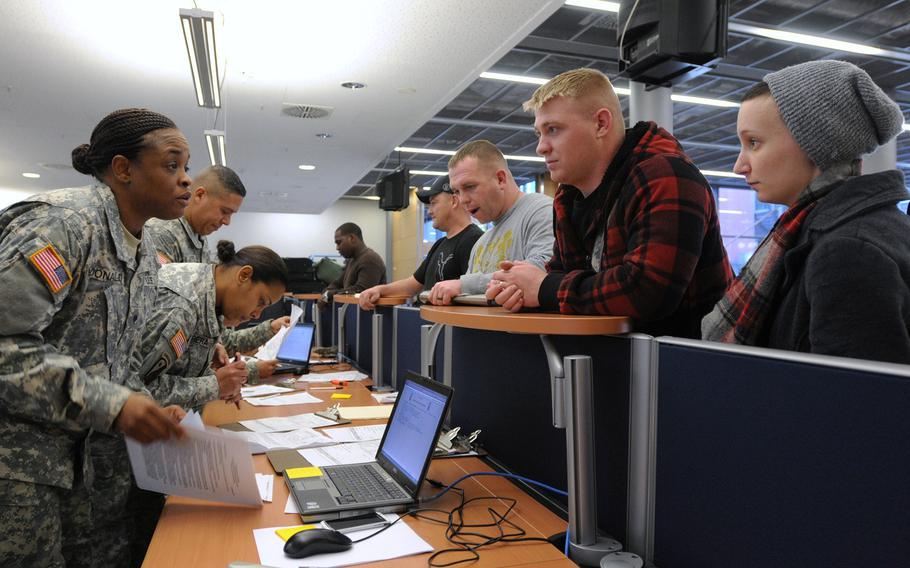 Soldiers get paperwork in order for troops arriving at Ramstein.