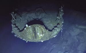 In this photo provided by the Ocean Exploration Trust, the chrysanthemum flower crest, an honored imperial symbol of Japan, can still be seen prominently on the bow of aircraft carrier Akagi 81 years after the aircraft carrier's sinking on Sept. 10, 2023. Footage from remote submersibles taken three miles under the Pacific Ocean is giving the world the first detailed glimpse of three World War II aircraft carriers that sunk in the pivotal Battle of Midway, which marked a shift in control of the Pacific naval theater from Japanese to U.S. forces.