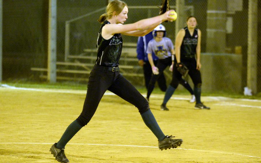 Kubasaki right-hander Quinn Suey-Schwartz delivers against Yokota in the nightcap of Friday's softball doubleheader. The Dragons won 14-7 after taking the opener 19-18.