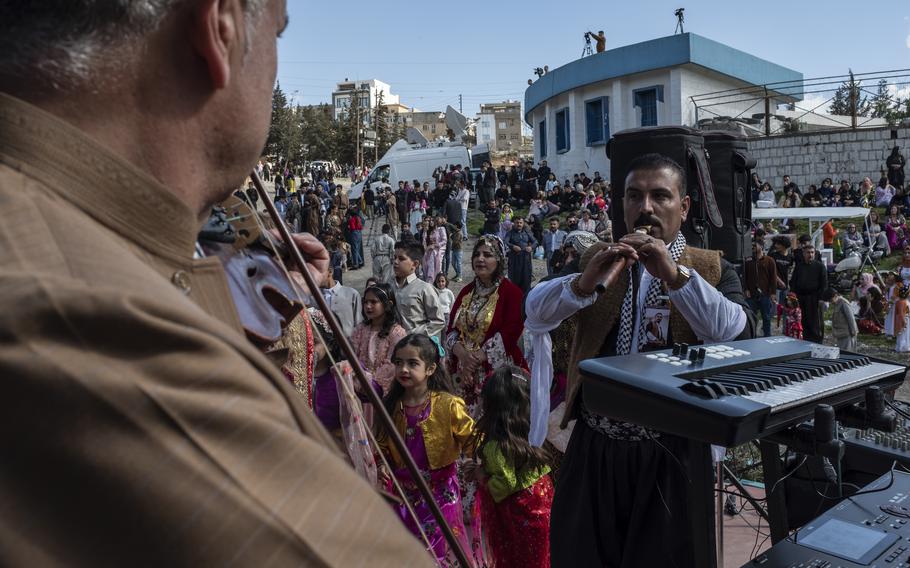 Iraqi Kurds celebrate Nowruz, a Persian New Year, in Sulaimaniyah, Iraq, Monday, March 20, 2023. The Kurdish in Iraq region won de facto self-rule in 1991 when the United States imposed a no-fly zone over it in response to Saddam’s brutal repression of Kurdish uprisings. With the American invasion 20 years ago much of Iraq fell into chaos, as occupying American forces fought an insurgency and as multiple political and sectarian communities vied to fill the power vacuum left in Baghdad. But the Kurds, seen as staunch allies of the Americans, strengthened their political position and courted foreign investments.