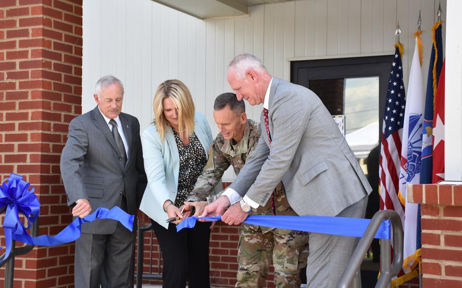 U.S. Army Space and Missile Defense Command's Richard P. De Fatta, deputy to the commander; Nicole Olbricht, Technical Center Systems Integration Division chief; Lt. Gen. Daniel L. Karbler, commanding general; and Michael Krause, Technical Center acting director, cut the ribbon at the dedication ceremony for the opening of the Air and Missile Systems Integration Lab on Aug. 8, 2022, at Redstone Arsenal, Ala. 