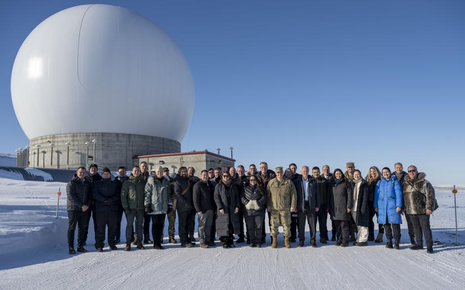 U.S. Space Force commander Gen. Chance Saltzman and guests stand in front of a radar dome belonging to the 23rd Space Operations Squadron Detachment 1 at Pituffik Space Base, Greenland, April 5, 2023. The unit's mission is to provide telemetry, tracking and commanding operations to U.S. and allied government satellite programs. 